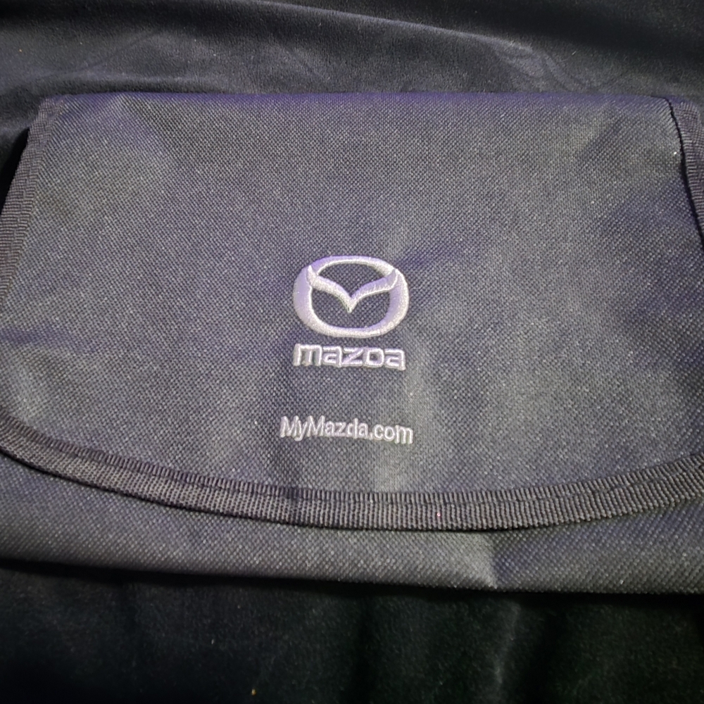 Canvas mazda glove box document holder
